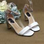 헤드 레이어 양가죽  여성 정장  샌들의 그림